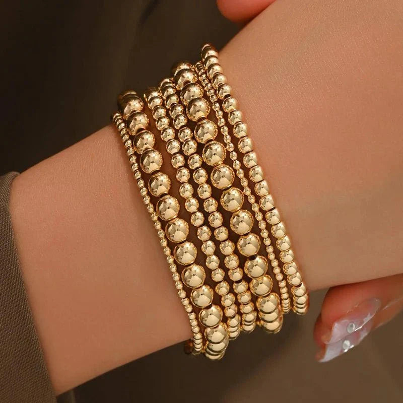 7pc Gold Beaded Bracelet Stack
